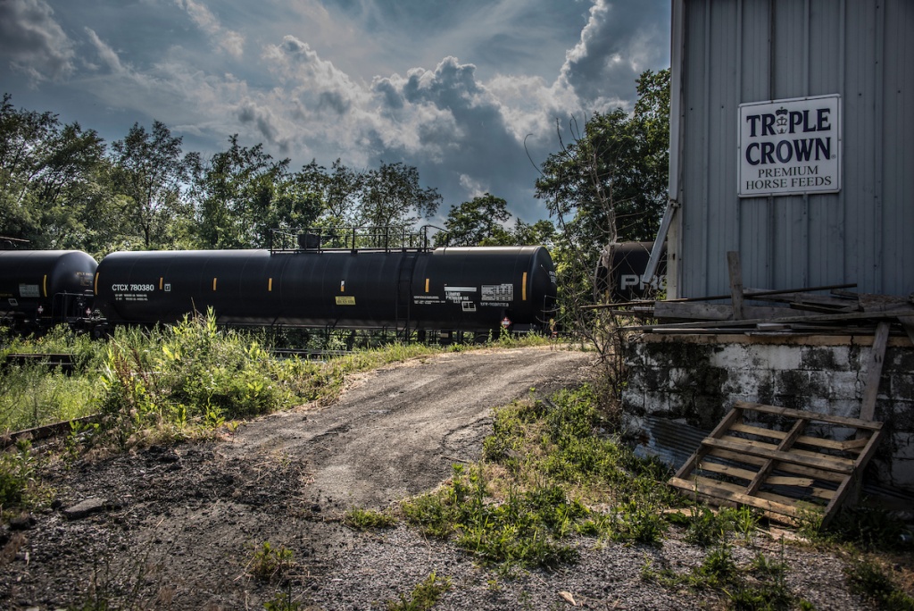 A bomb train passes by a feed store in Mount Pleasant Township, Washington County, PA. Families in Washington Co., Pa who are facing possible issues through the creation of cybergentic gas processing plant in western Pa. A feed store, Mount Pleasant Township